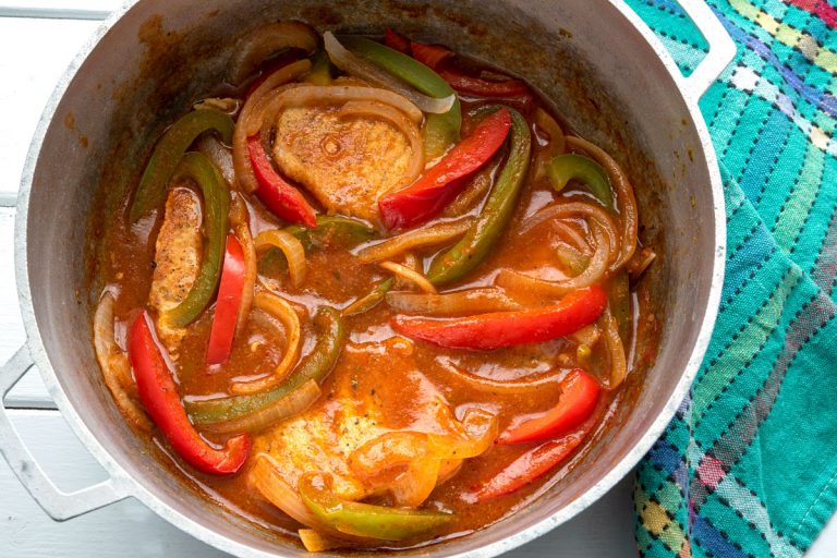 Stewed pork chops with peppers and onions