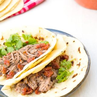 Authentic Mexican shredded machaca beef recipe in the crockpot. Delicious in tacos or with eggs!