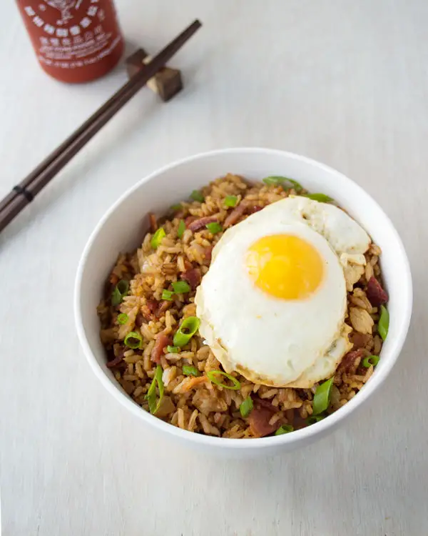 Bacon Fried Rice with a fried egg on top! Quick and easy breakfast, lunch or dinner!