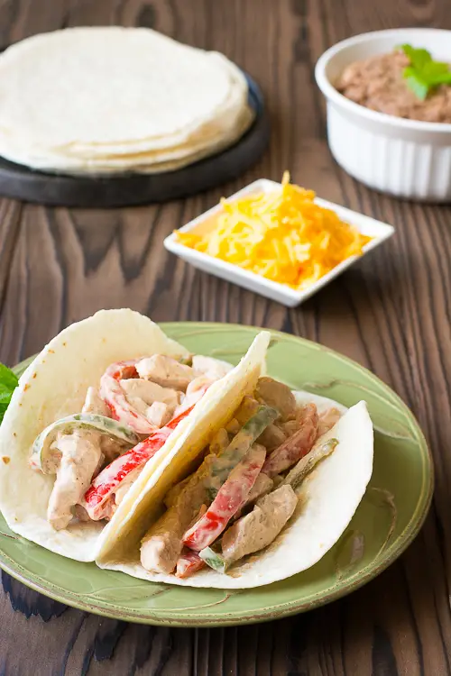 Creamy Chicken Tacos with peppers and salsa: quick and easy weeknight dinner! | Kitchen Gidget