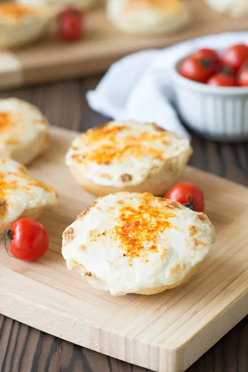 Hot, creamy crab dip, broiled until golden and bubbly! Serve this easy crab dip appetizer on mini buns or with crackers for scooping | Kitchen Gidget