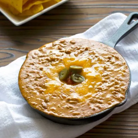 Easy, creamy meatless Chili Cheese Bean Dip with all natural ingredients - no processed junk food here! Perfect for gameday! #cleaneating #realfood #appetizer | Kitchen Gidget