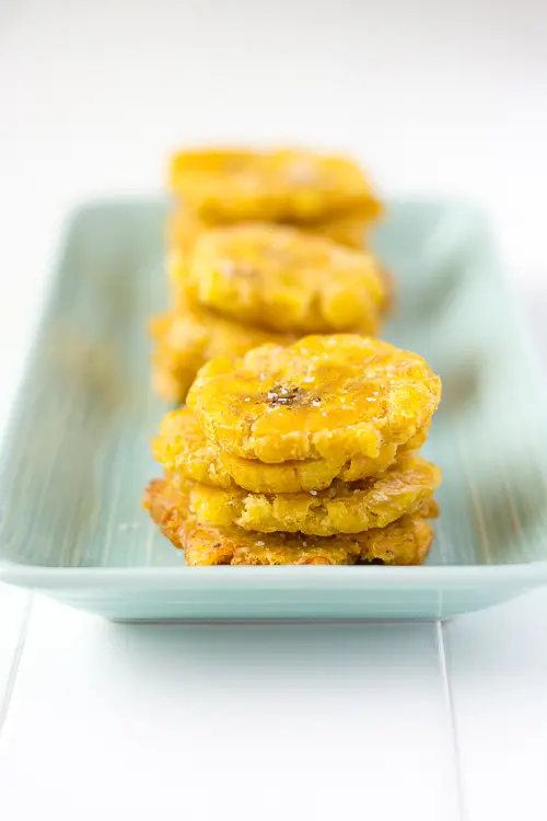 Puerto Rican Tostones (Fried Plantains) with 2 dippings sauces: MayoKetchup & Mojo de Ajo (Garlic Oil) | Kitchen Gidget