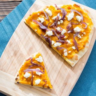 Winter Squash Feta Flatbread recipe with caramelized red onions and feta cheese. Great with butternut, kabocha, acorn squash or even sweet potatoes!