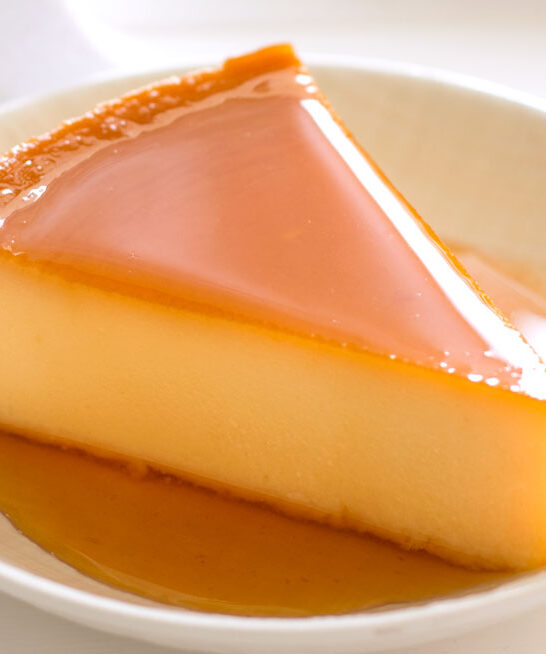 Slice of cheese flan on a small plate