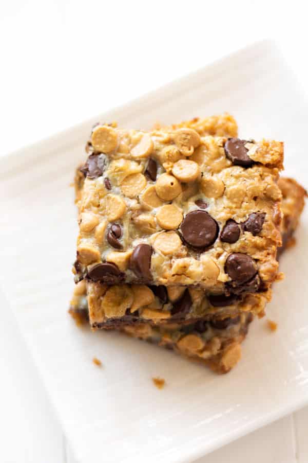 5 ingredient Chocolate Peanut Butter Magic Bars! Rich and fudgy one pan dessert with sweetened condensed milk and a graham cracker crust.