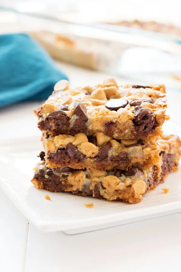 5 ingredient Chocolate Peanut Butter Magic Bars! Rich and fudgy one pan dessert with sweetened condensed milk and a graham cracker crust.