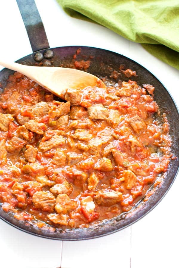 Mexican Pork Stew (Puerco en Salsa Roja) is an easy dinner with only 2 ingredients! Serve with homemade corn tortillas. | Kitchen Gidget
