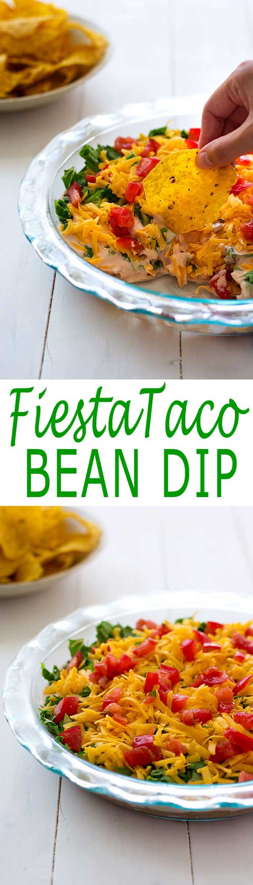 Fiesta Bean Dip layered with refried beans, salsa, sour cream, cheese, lettuce and tomatoes! | Kitchen Gidget