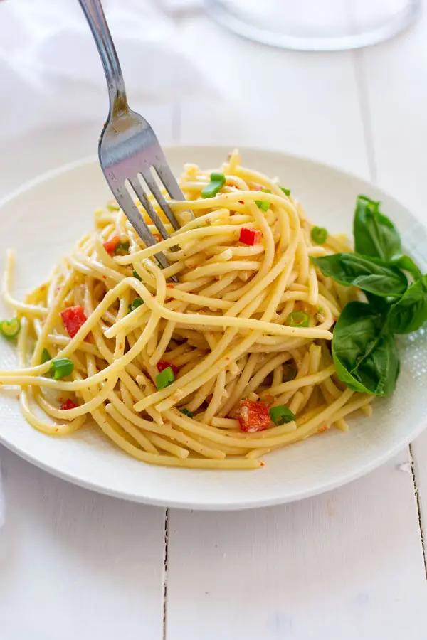 Chilled spaghetti salad with Italian dressing and a little mayonnaise. The zesty-creamy combo is the best of both worlds!