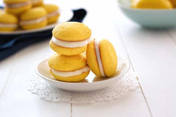 Lemon Ricotta Sandwich Cookies. They start with a cake mix and are super spongy with a sweet ricotta filling!