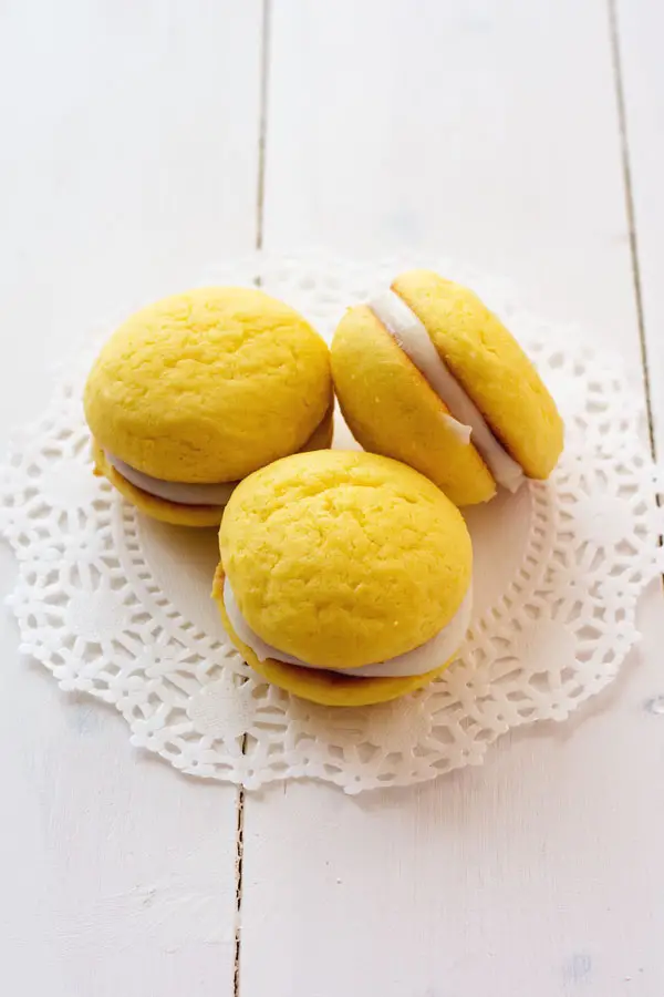 Lemon Ricotta Sandwich Cookies. They start with a cake mix and are super spongy with a sweet ricotta filling!