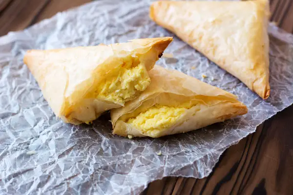 Tiropita: Greek-style hand pies which are light, crispy and filled with feta cheese! Great as party appetizers or served with a light summer salad