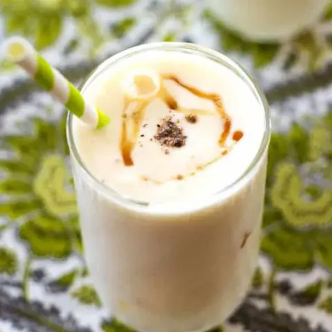 Maple lassi is a creamy yogurt-based drink lightly spiced with cardamom and sweetened with all-natural pure maple syrup. Poured over ice, this beverage is the ultimate thirst quencher!