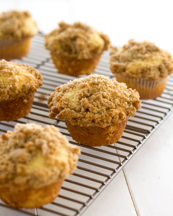 If you love coffee cake, you’ll love these cinnamon streusel muffins! Soft vanilla muffins topped with brown sugar crumbles. Perfect for a weekend brunch or breakfast on the go!