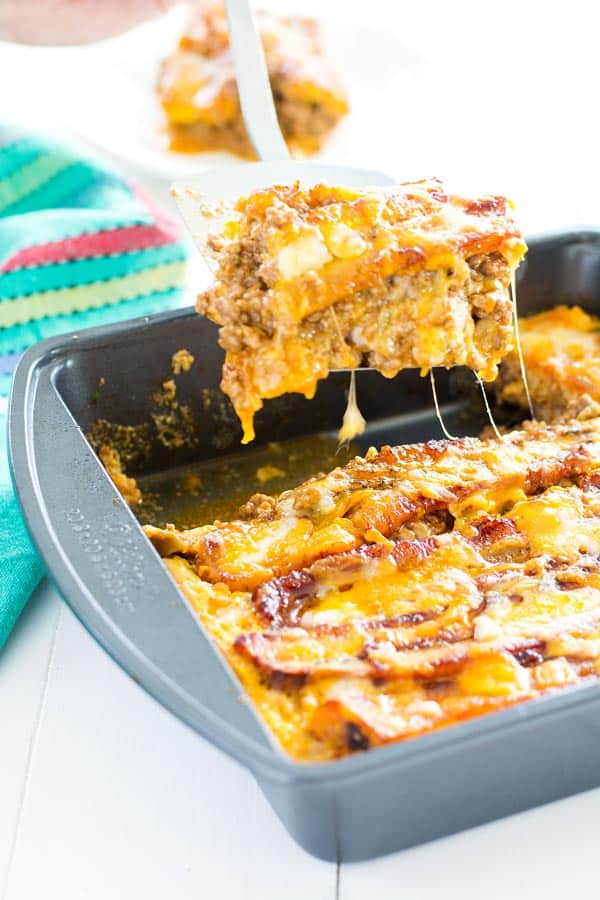 Puerto Rican Lasagna (Pastelón) with sweet slices of plantains instead of noodles, saucy beef picadillo and plenty of cheese.