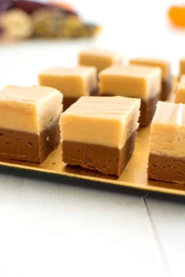Easy chocolate peanut butter fudge is a nostalgic treat! Creamy confection with two layers of chocolate and peanut butter!
