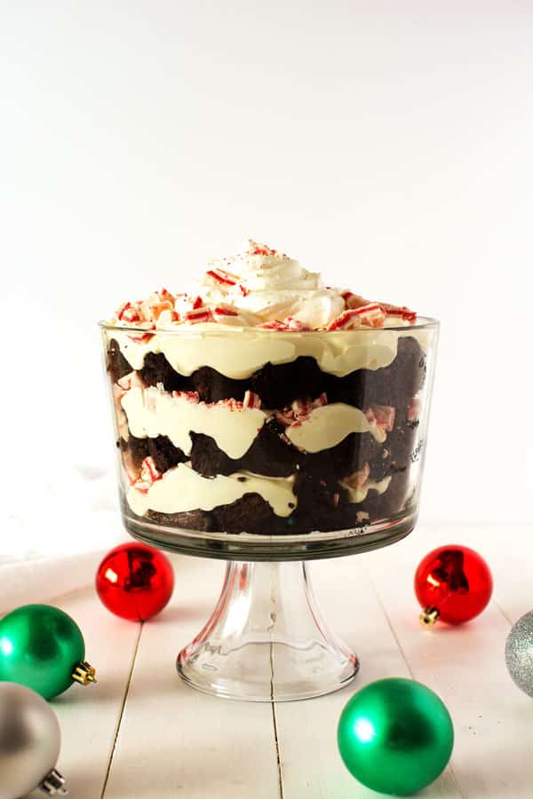 Chocolate Peppermint Trifle with layers of fudgy chocolate brownies, cheesecake pudding and cool peppermint combine in this festive dessert!