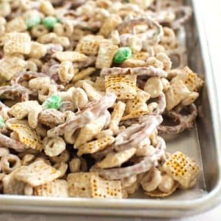 White Chocolate Chex Mix. Everyone loves this Christmas Chex mix with white chocolate, Cheerios, pretzels and peanuts!