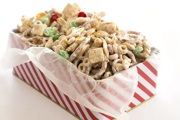 White Chocolate Chex Mix. Everyone loves this Christmas Chex mix with white chocolate, Cheerios, pretzels and peanuts!