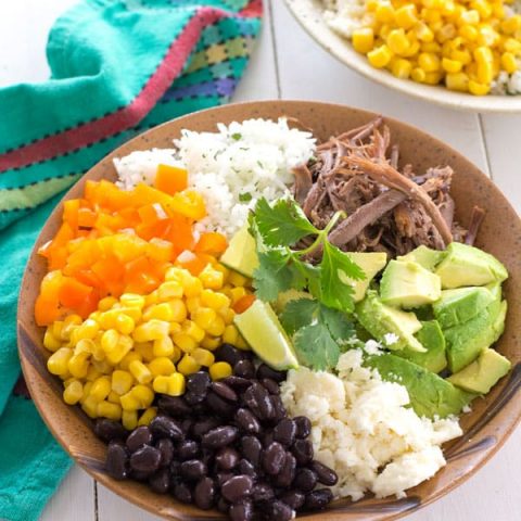 Make a healthy chicken burrito bowl with this homemade burrito bowl recipe!