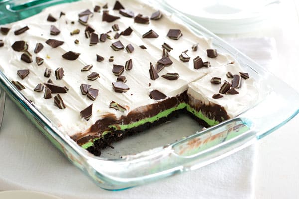Mint Chocolate Lasagna no-bake dessert with layers of mint cream cheese and chocolate pudding on an Oreo crust. This cool, minty Oreo Delight is the perfect ending to any meal!