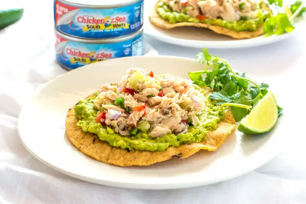 This Mexican tuna salad is a fiesta for your taste buds! Kick your tuna up a notch with this fresh and easy version that goes well with avocado!