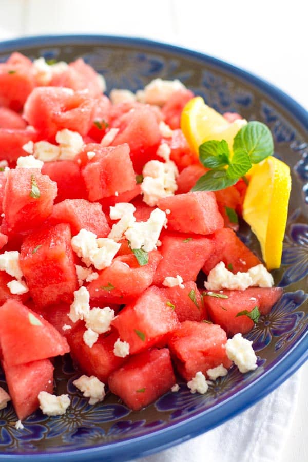 Serve this Watermelon and Feta salad with lemon and mint as a salad or appetizer! Summer on a plate.