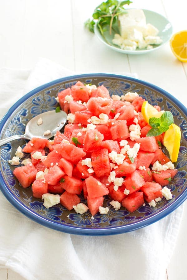 Serve this Watermelon and Feta salad with lemon and mint as a salad or appetizer! Summer on a plate.