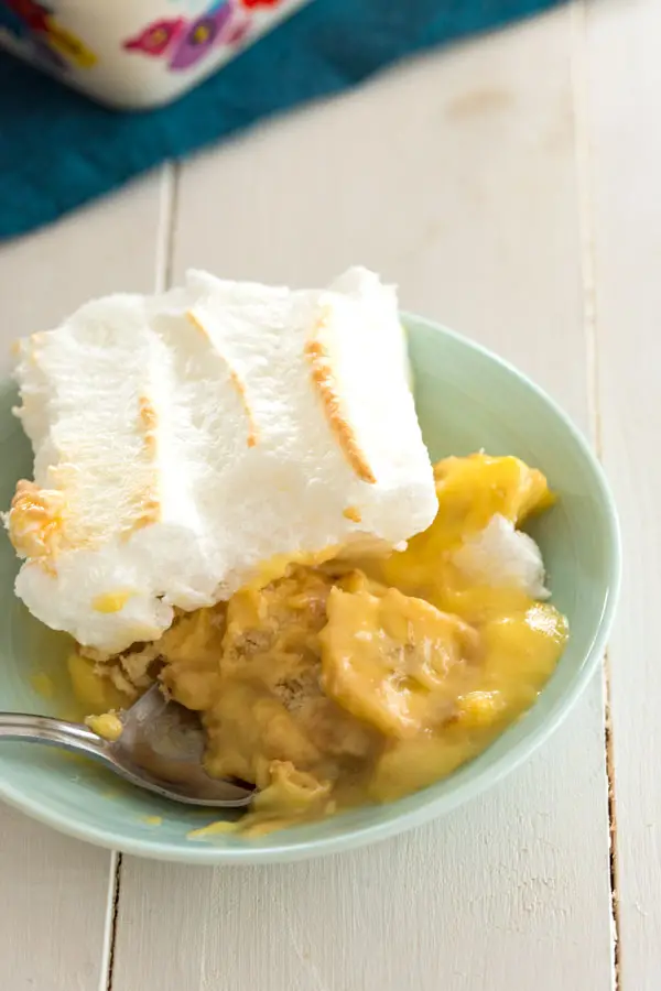 The BEST easy homemade Banana Pudding FROM SCRATCH! This old fashioned southern dessert recipe has a meringue topping and Nilla wafers!