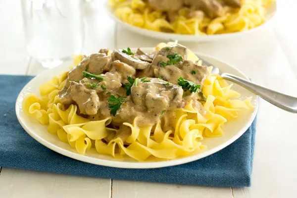 Easy homemade beef stroganoff recipe from scratch with steak and the most delicious sour cream sauce!