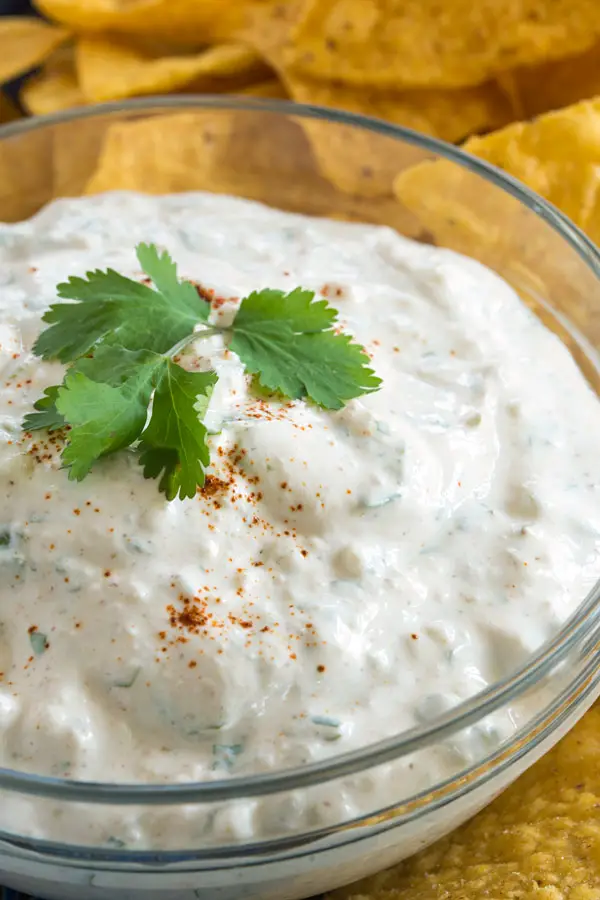 Creamy sour cream, fresh cilantro, crumbled queso fresco and a few Mexican spices are all you need to make this easy queso fresco dip!