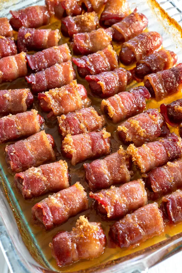 Little Smokies Wrapped in Bacon with brown sugar after baking #appetizers #appetizerseasy #easyappetizerideas #superbowlparty
