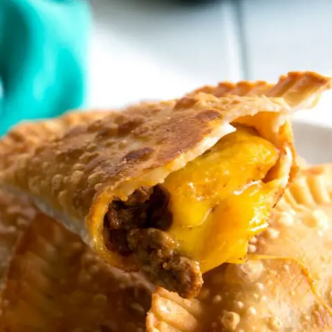 Inside shot of Pastelón Empanadas with cheese, plantain and picadillo filling