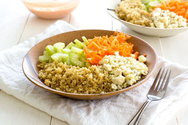 Buffalo Chicken Quinoa Bowl with blue cheese, celery, onion and creamy hot sauce dressing