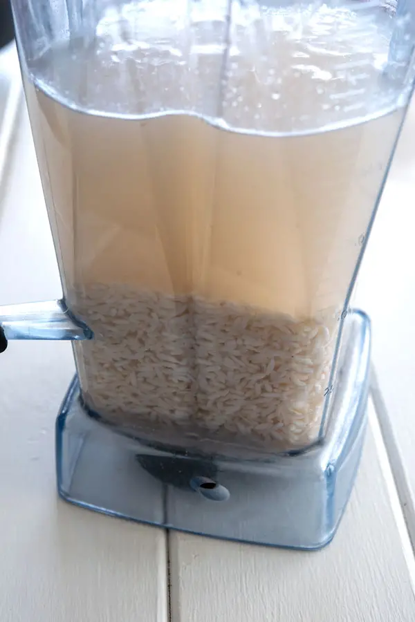 Rice soaking in water for strawberry horchata