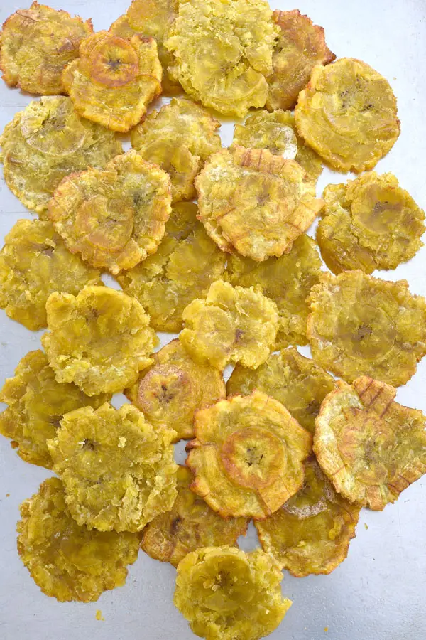 Layer of tostones on cookie sheet for tostone nachos