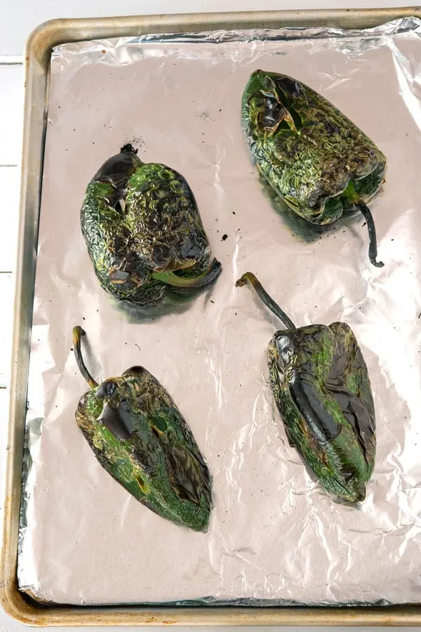 Four roasted poblano peppers