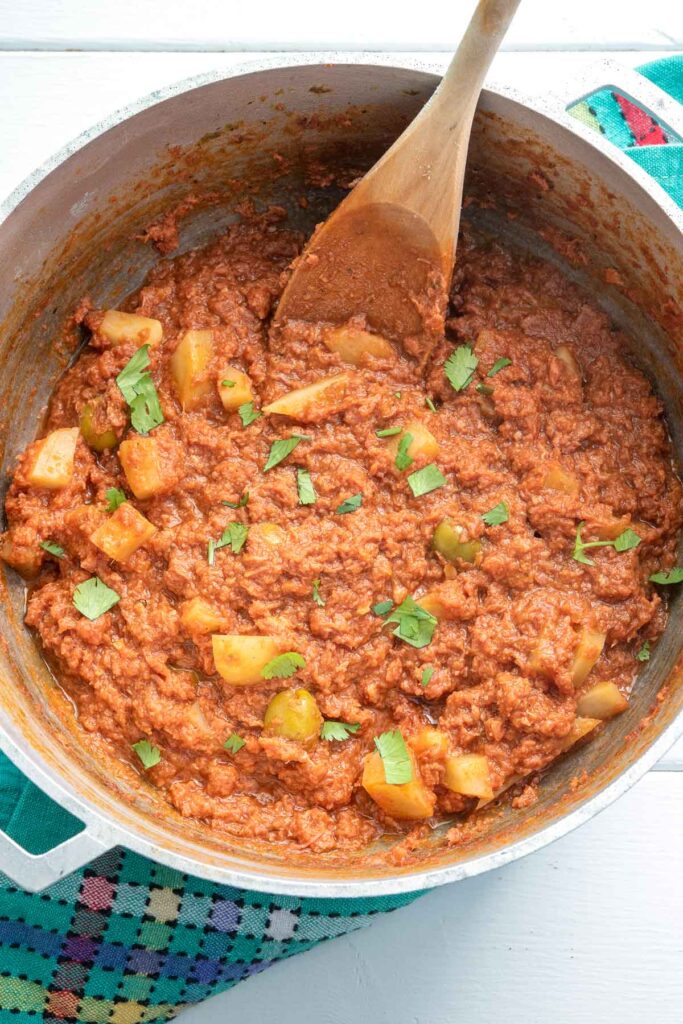 Pot of canned corned beef with potatoes