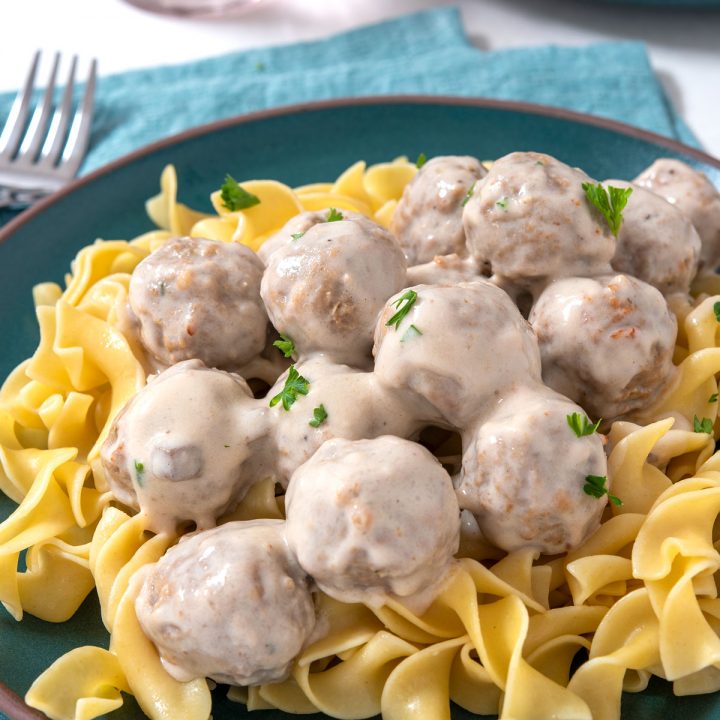 Plate of meatballs and gravy with egg noodles