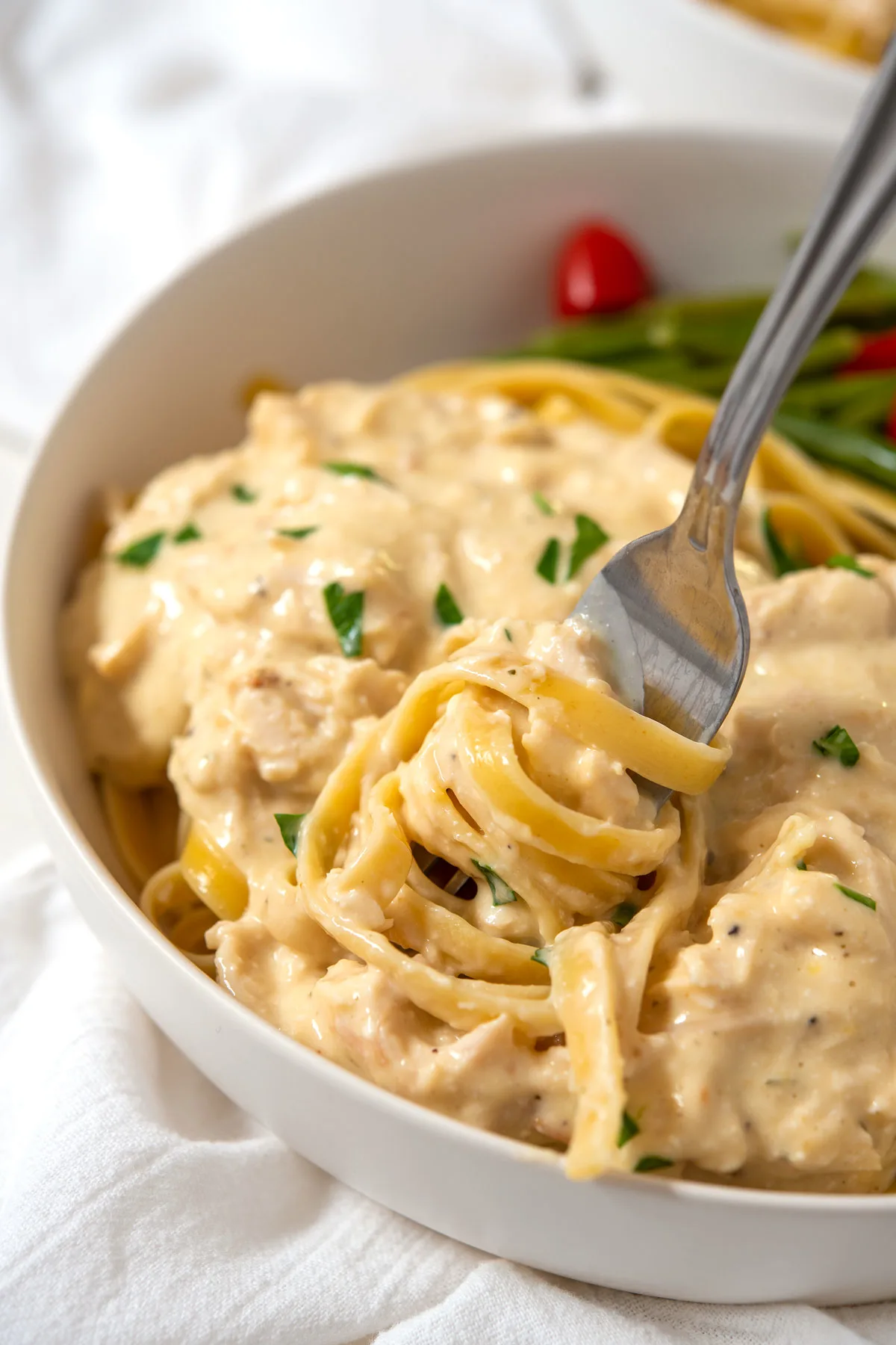 Plate of creamy Italian chicken with linguine
